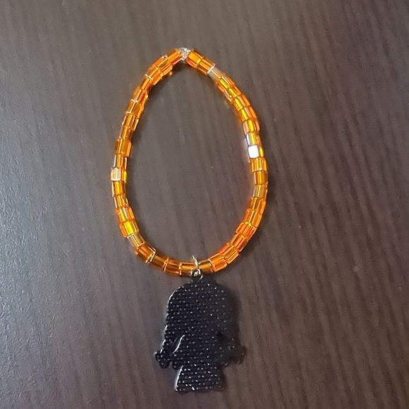 Halloween Orange beaded stretch bracelet with Annabelle Charm - Picture 2 of 4